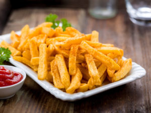 A plate of french fries, to show that fried foods are bad for GERD
