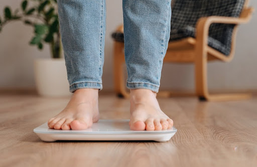 Woman checking BMI for weightloss surgery.